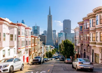 Street-level view of downtown San Francisco with for lease signs