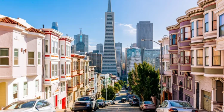 Street-level view of downtown San Francisco with for lease signs