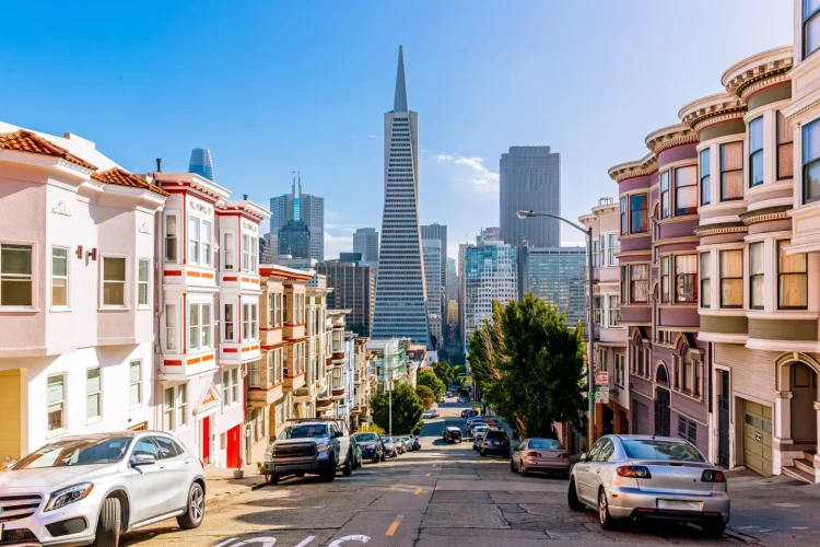 Street-level view of downtown San Francisco with for lease signs