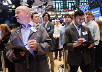 U.S. markets rise as tax cuts clear key hurdle, but Trump stirs tariff uncertainty