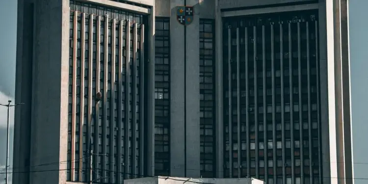 Front view of a striking government building in Ukraine under a clear sky.