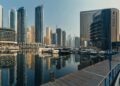 Explore the breathtaking skyline of Dubai Marina with iconic skyscrapers and luxury yachts.