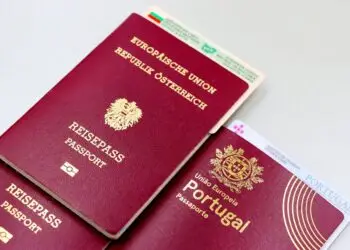 EU Citizenship by Investment: What Ended, What Remains in 2026 — A close-up image of Austrian and Portuguese passports with a Bulgarian ID card.