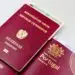 EU Citizenship by Investment: What Ended, What Remains in 2026 — A close-up image of Austrian and Portuguese passports with a Bulgarian ID card.
