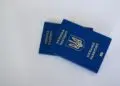 How to Get a Second Passport: Investment Routes and Residency Paths — Image of two Ukrainian passports on a white surface, highlighting travel and identification themes.