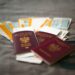 How to Apply for a Second UK Passport Online — Close-up of Polish passports and travel tickets symbolizing travel and adventure.