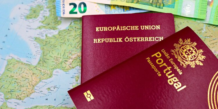 Golden Visa EU: Complete 2026 Comparison of Active Investment Routes — Austrian and Portuguese passports on a European map with euro banknotes.