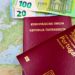 Golden Visa EU: Complete 2026 Comparison of Active Investment Routes — Austrian and Portuguese passports on a European map with euro banknotes.