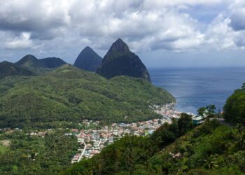 St. Lucia Citizenship by Investment: Full 2026 Programme Guide — Discover the lush green landscapes and iconic Pitons of Soufriere, Saint Lucia from above.