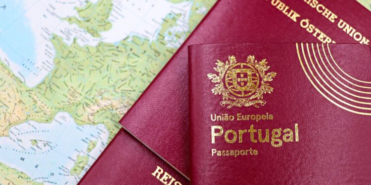 Why the Cheapest Citizenship by Investment Programmes Are Often the Worst Deal — Close-up of Portuguese and Austrian passports lying on a map of Europe, symbolizing travel and mobility.