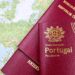 Why the Cheapest Citizenship by Investment Programmes Are Often the Worst Deal — Close-up of Portuguese and Austrian passports lying on a map of Europe, symbolizing travel and mobility.