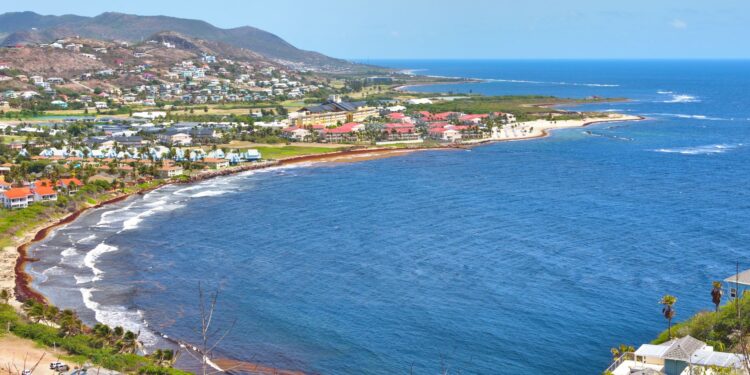 Citizenship by Investment in St. Kitts & Nevis: Complete 2026 Guide — Explore the stunning coastline and turquoise waters of Frigate Bay in Saint Kitts, a perfect travel destination.