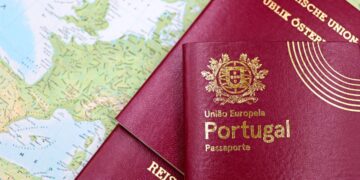 Why the Cheapest Citizenship by Investment Programmes Are Often the Worst Deal — Close-up of Portuguese and Austrian passports lying on a map of Europe, symbolizing travel and mobility.
