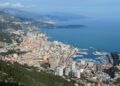 Where to hold crypto without paying capital gains: seven jurisdictions — Breathtaking aerial view of Monaco with its vibrant cityscape, coastline, and harbor.