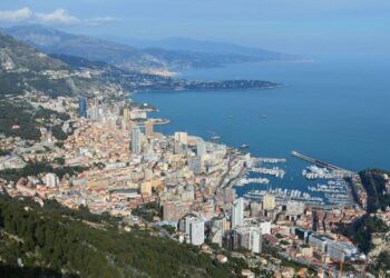 Where to hold crypto without paying capital gains: seven jurisdictions — Breathtaking aerial view of Monaco with its vibrant cityscape, coastline, and harbor.