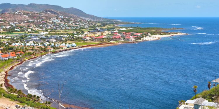 Citizenship by Investment in St. Kitts & Nevis: Complete 2026 Guide — Explore the stunning coastline and turquoise waters of Frigate Bay in Saint Kitts, a perfect travel destination.