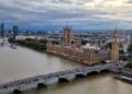 UK Non-Dom Tax Status: What Changed in April 2025 and What Comes Next — Stunning aerial photo of Big Ben and Houses of Parliament in London at dusk.