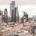 Non-Dom Tax: Complete UK Guide to Abolished Rules and New Regime — A stunning aerial view of London's modern skyscrapers under overcast skies, showcasing its architectural marvels.