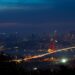 Turkish Citizenship by Investment: The $400,000 Route to a Second Passport — Illuminated Bosphorus Bridge and Istanbul cityscape captured at night creating a breathtaking urban scene.