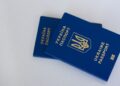 Golden Visa Requirements: Complete 2026 Eligibility Guide — Image of two Ukrainian passports on a white surface, highlighting travel and identification themes.