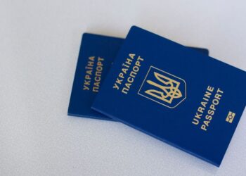 Golden Visa Requirements: Complete 2026 Eligibility Guide — Image of two Ukrainian passports on a white surface, highlighting travel and identification themes.