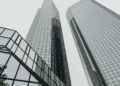 Modern city skyline with office buildings, representing global wealth and financial centres