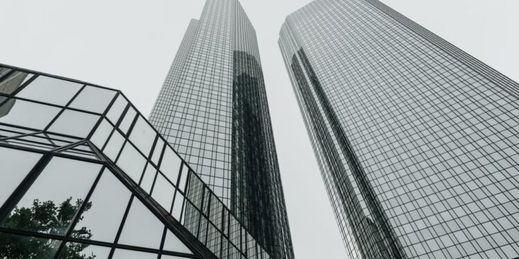 Modern city skyline with office buildings, representing global wealth and financial centres