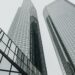 Modern city skyline with office buildings, representing global wealth and financial centres