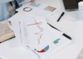 Charts and data on a desk, illustrating the index methodology