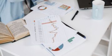 Charts and data on a desk, illustrating the index methodology