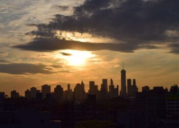 Manhattan financial district skyline viewed across water